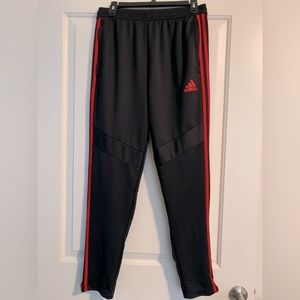 Men’s Adidas track pants.